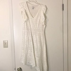 Slanted eyelit dress, flutter sleeves. A new day